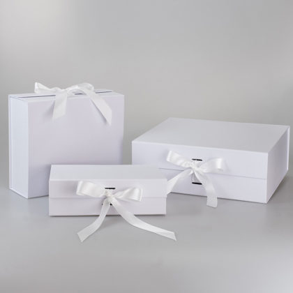 White folding gift box with magnetic clasp and ribbon，
